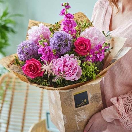 This dreamy bunch will feature at least three of the perfect puffball peonies along with other beautiful seasonal blooms